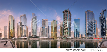 Jumeirah Lakes Towers in Dubai during sunny morning Jumeirah Lakes Towers in Dubai during sunny morning 49205333
