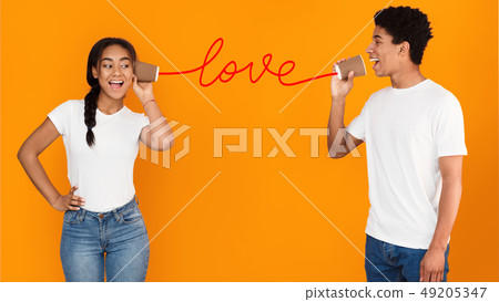 Guy singing love song to his girlfriend Guy singing love song to his girlfriend 49205347