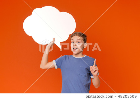 Young Boy looking up and thinking with light bulb in bubbles 49205509