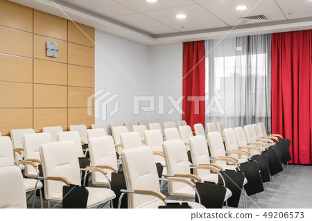 Empty modern conference hall in new hotel. Room for training, education, group classes, exams 49206573