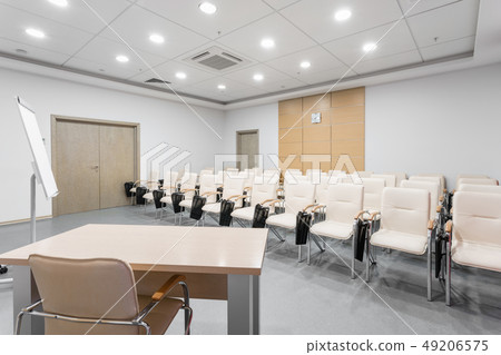 Empty modern conference hall in new hotel. Room for training, education, group classes, exams Empty modern conference hall in new hotel. Room for training, education, group classes, exams 49206575