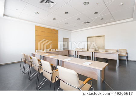 Empty modern conference hall in new hotel. Room for training, education, group classes, exams Empty modern conference hall in new hotel. Room for training, education, group classes, exams 49206617