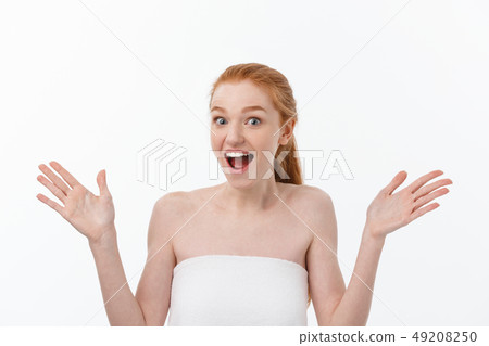Skin care beauty woman showing empty palm with copy space for product. Excited smiling Caucasian Skin care beauty woman showing empty palm with copy space for product. Excited smiling Caucasian 49208250