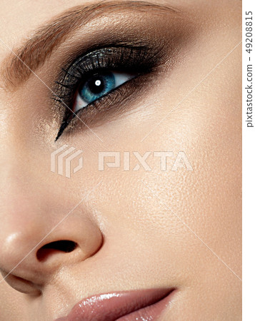 Portrait of beautiful woman with fashion make up 49208815