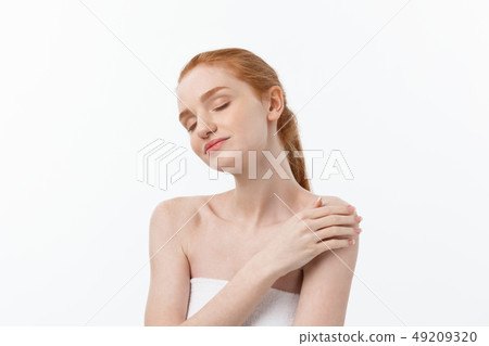 Beauty Woman. Beautiful Young Female touching Her Skin. Portrait isolated on White Background 49209320