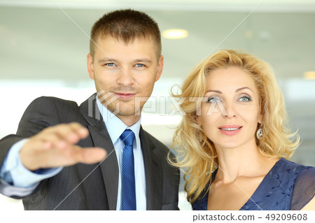 Businessman in suit show to mature woman something amazing Businessman in suit show to mature woman something amazing 49209608