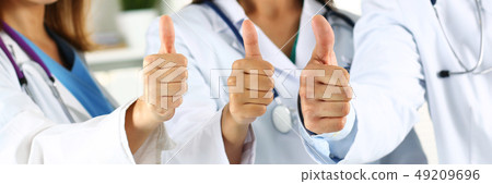 Three medicine doctor hands showing OK or approval sign Three medicine doctor hands showing OK or approval sign 49209696