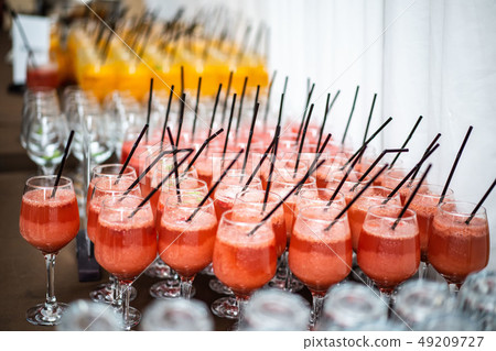 Many glasses of mulled wine and various alcoholic beverages Many glasses of mulled wine and various alcoholic beverages 49209727