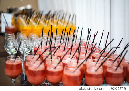 Many glasses of mulled wine and various alcoholic beverages Many glasses of mulled wine and various alcoholic beverages 49209729