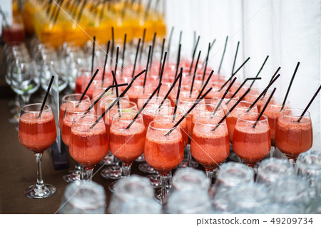 Many glasses of mulled wine and various alcoholic beverages Many glasses of mulled wine and various alcoholic beverages 49209734