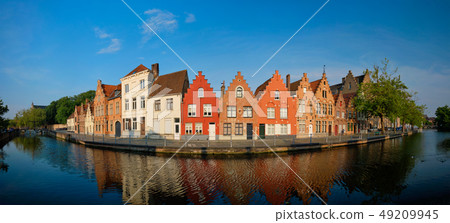 Canal and old houses. Bruges (Brugge), Belgium Canal and old houses. Bruges (Brugge), Belgium 49209945