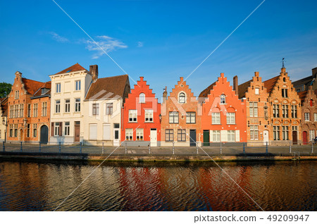 Canal and old houses. Bruges (Brugge), Belgium Canal and old houses. Bruges (Brugge), Belgium 49209947