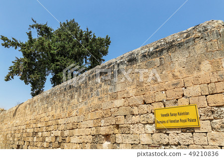 Sign Venetian palace ruins in Turkish and English Sign Venetian palace ruins in Turkish and English 49210836