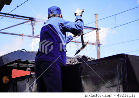 Engineer who piles coal on Oigawa Shindo SL train Engineer who piles coal on Oigawa Shindo SL train 49212112