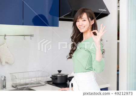 Woman cooking Woman cooking 49212973