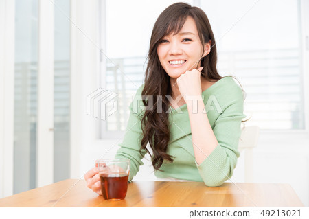 Female drink to relax in the room Female drink to relax in the room 49213021