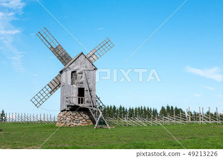 Windmill against blue sky in etnographic museum in 49213226