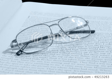 The book and the glasses 49213263