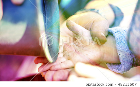 Children's hands and adult hands to take soil from potted plants Children's hands and adult hands to take soil from potted plants 49213607