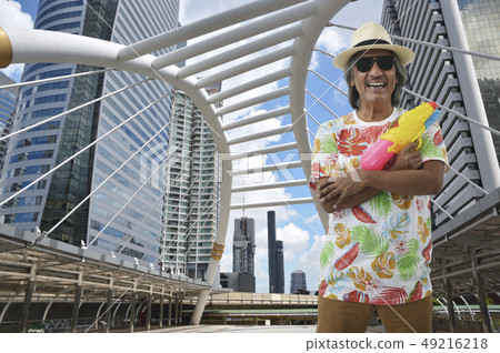 Celebrating traditional Thai New Year Songkran Celebrating traditional Thai New Year Songkran 49216218