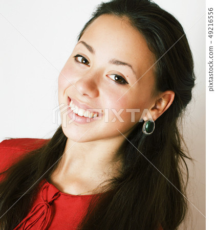young pretty brunette woman smiling happy on white background, lifestyle people concept young pretty brunette woman smiling happy on white background, lifestyle people concept 49216556