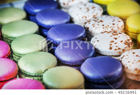 macaroon cakes of different colors on the counter macaroon cakes of different colors on the counter 49216991