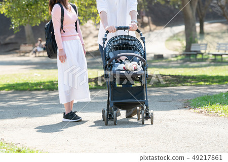 Stroller family baby park walk parenting Stroller family baby park walk parenting 49217861