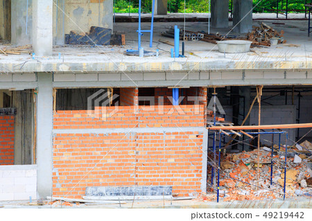 construction workers site and building of housing 49219442