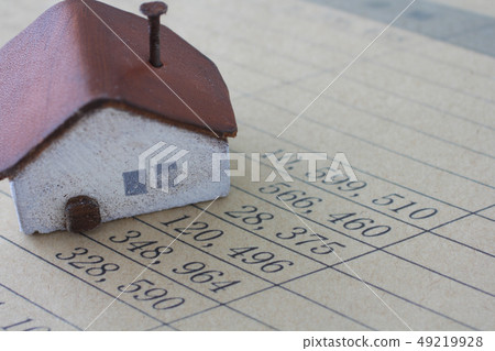Model written on paper with paper, pencil, calculator and house 49219928