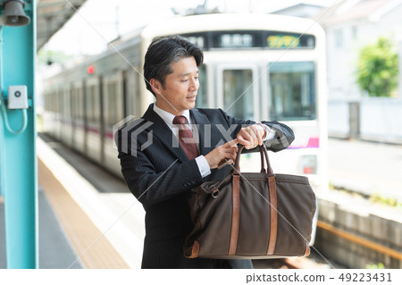 Businessman train station photography cooperation: Keio Electric Railway Co., Ltd. Businessman train station photography cooperation: Keio Electric Railway Co., Ltd. 49223431