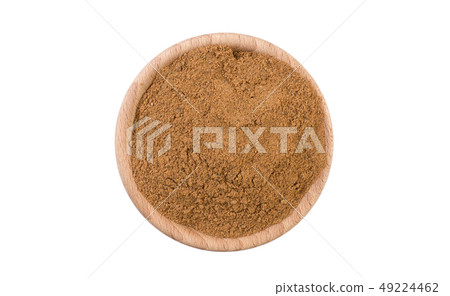 milled or ground nutmeg in wooden bowl isolated on milled or ground nutmeg in wooden bowl isolated on 49224462
