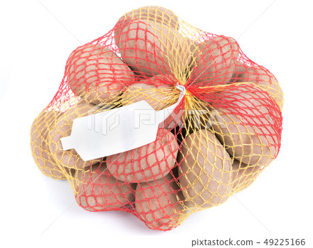 Ripe potatoes in string bag Ripe potatoes in string bag 49225166