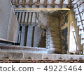 Concrete staircase with wrought iron railings 49225464