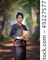 Asian women in native costume. 49227577