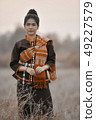 Asian women in Phutai costume at meadow 49227579