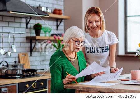 Alluring volunteer making clear for dame notification about overdue loan 49228055