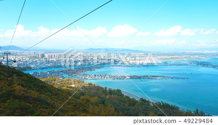 Cable car against the background of the Hainan Province, China 49229484