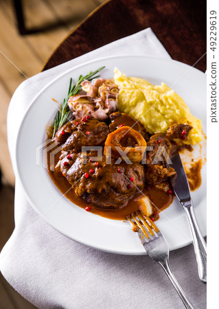Ossobuco with hummus 49229619