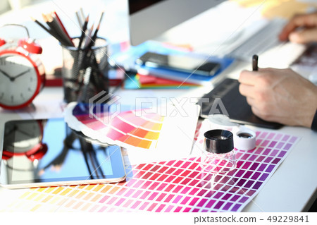 Test print paper page with colour test design fantail and magnifying glass Test print paper page with colour test design fantail and magnifying glass 49229841