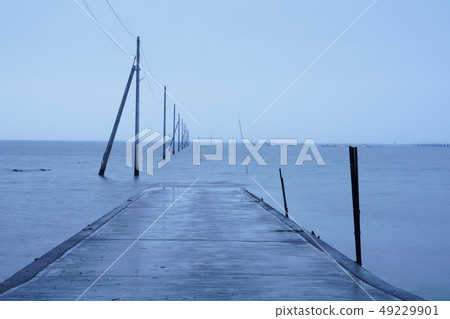 A beach with a road in the sea of Uto city A beach with a road in the sea of Uto city 49229901