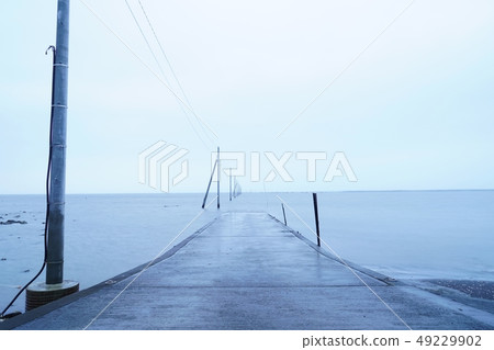 A beach with a road in the sea of Uto city A beach with a road in the sea of Uto city 49229902