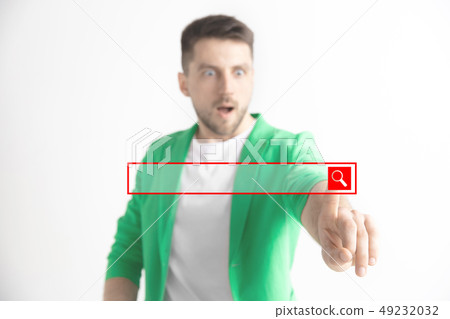 Businessman hand touching empty virtual screen Businessman hand touching empty virtual screen 49232032