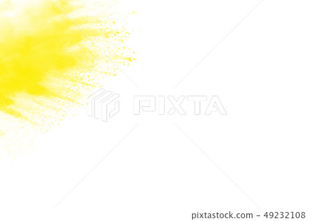 Yellow color powder splatter on white background. Yellow color powder splatter on white background. 49232108