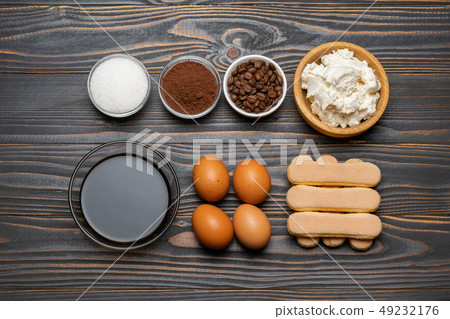 Ingredients for cooking tiramisu - Savoiardi biscuit cookies, mascarpone, cheese, sugar, cocoa 49232176