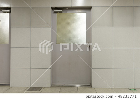 sidewalk by street wall & door sidewalk by street wall & door 49233771