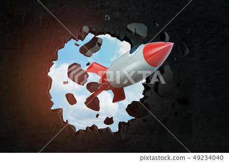 3d closeup rendering of toy space rocket punching hole in black wall with sky peeking through. 3d closeup rendering of toy space rocket punching hole in black wall with sky peeking through. 49234040