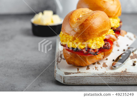 Breakfast sandwiches with scrambled egg Breakfast sandwiches with scrambled egg 49235249