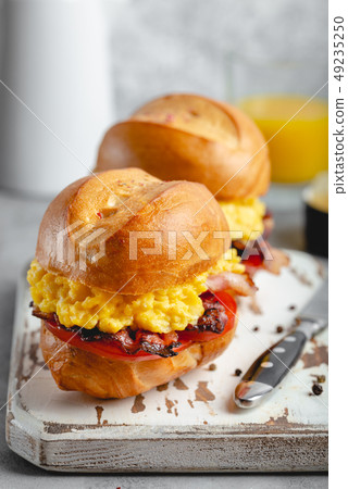 Breakfast sandwiches with scrambled egg Breakfast sandwiches with scrambled egg 49235250