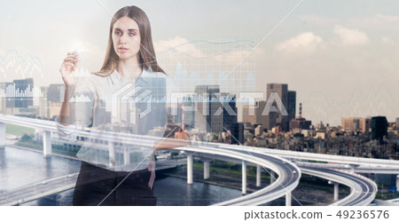 Beautiful business woman and modern business concept Beautiful business woman and modern business concept 49236576