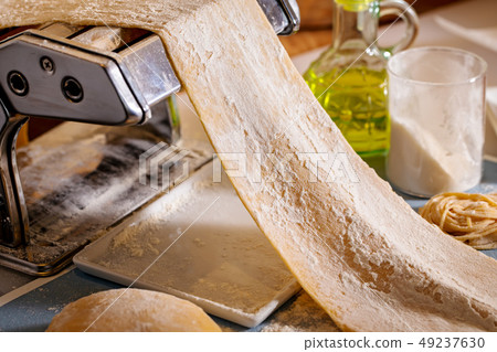 Fresh stretched dough  49237630